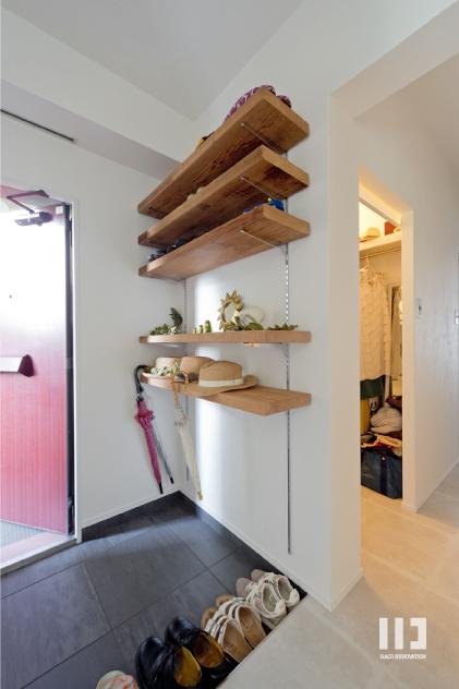 「こだわりの木材の似合う家」の玄関・土間