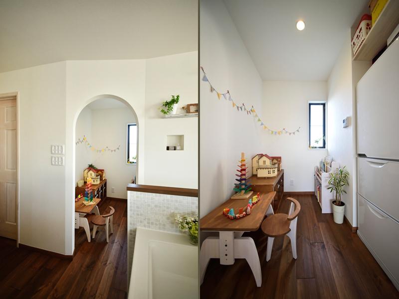 冷蔵庫が入る大型のパントリーです。ローデスクや棚を置いてキッズルームにも利用。R型下がり壁が優しい印象です。