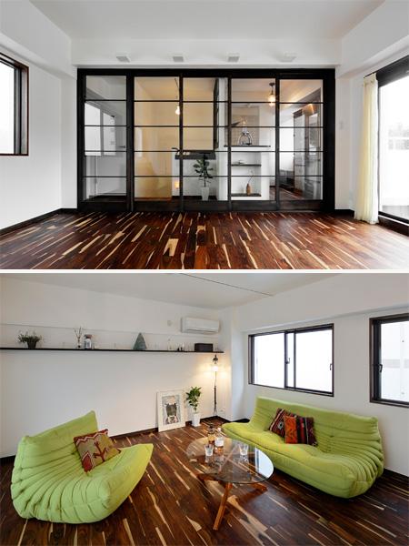 「ローズウッドの床材は少し不安でしたが全室に採用して本当に良かった」とご好評のLDです。 照明は暖色系・ソファはモスグリーンのセレクトで心和む空間になりました。高めに造作したディスプレイ棚が印象的です。