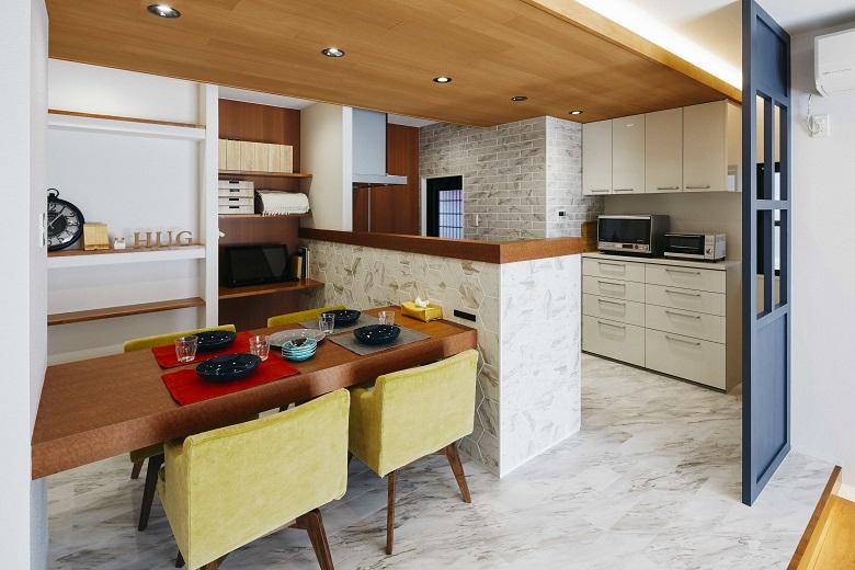 リビングとは対照的に石目調のタイルや床材を多用したダイニングスペースはラグジュアリーなテイストに。