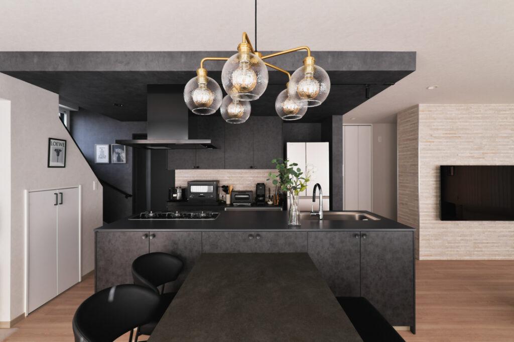 キッチン上部の下がり天井はキッチンと同色のマットグレーのクロスを張りました。写真手前は施主様チョイスの真鍮製の照明。モノトーンで暗くなりすぎずぴったりのアクセントに。